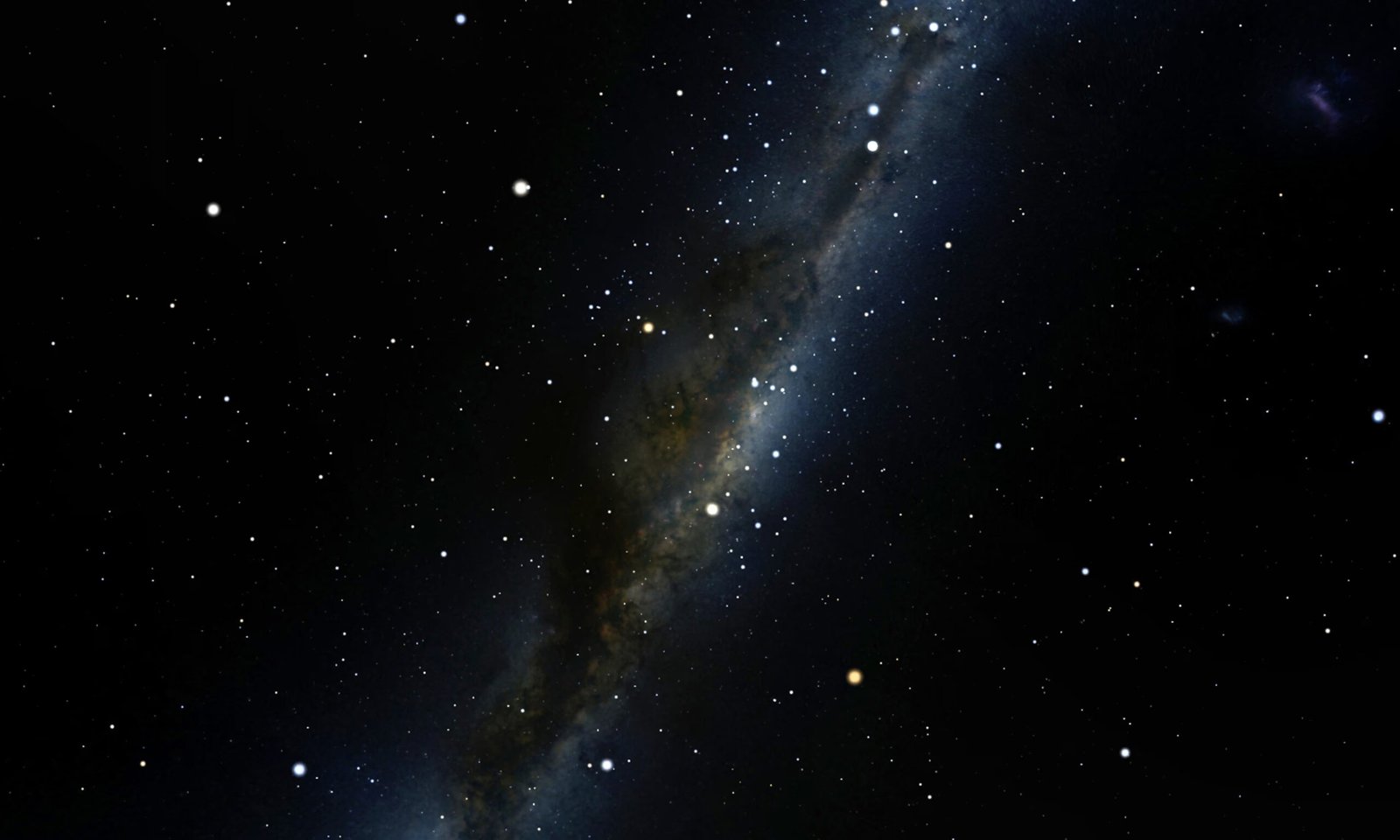 Wide-field astrophotography of the Milky Way core revealing the full length of the Indigenous Australian "Emu in the Sky" dark nebula constellation, stretching from its head at the Coalsack Nebula down to its legs in Scorpius