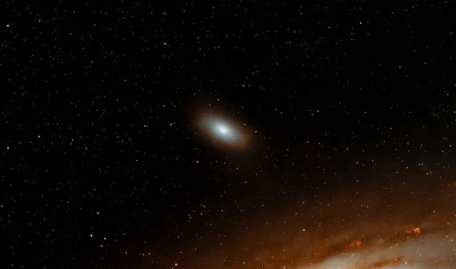 The graceful companion to a galactic giant. Messier 110 is a dwarf elliptical galaxy orbiting Andromeda, independently discovered by the legendary astronomer Caroline Herschel in August 1783.