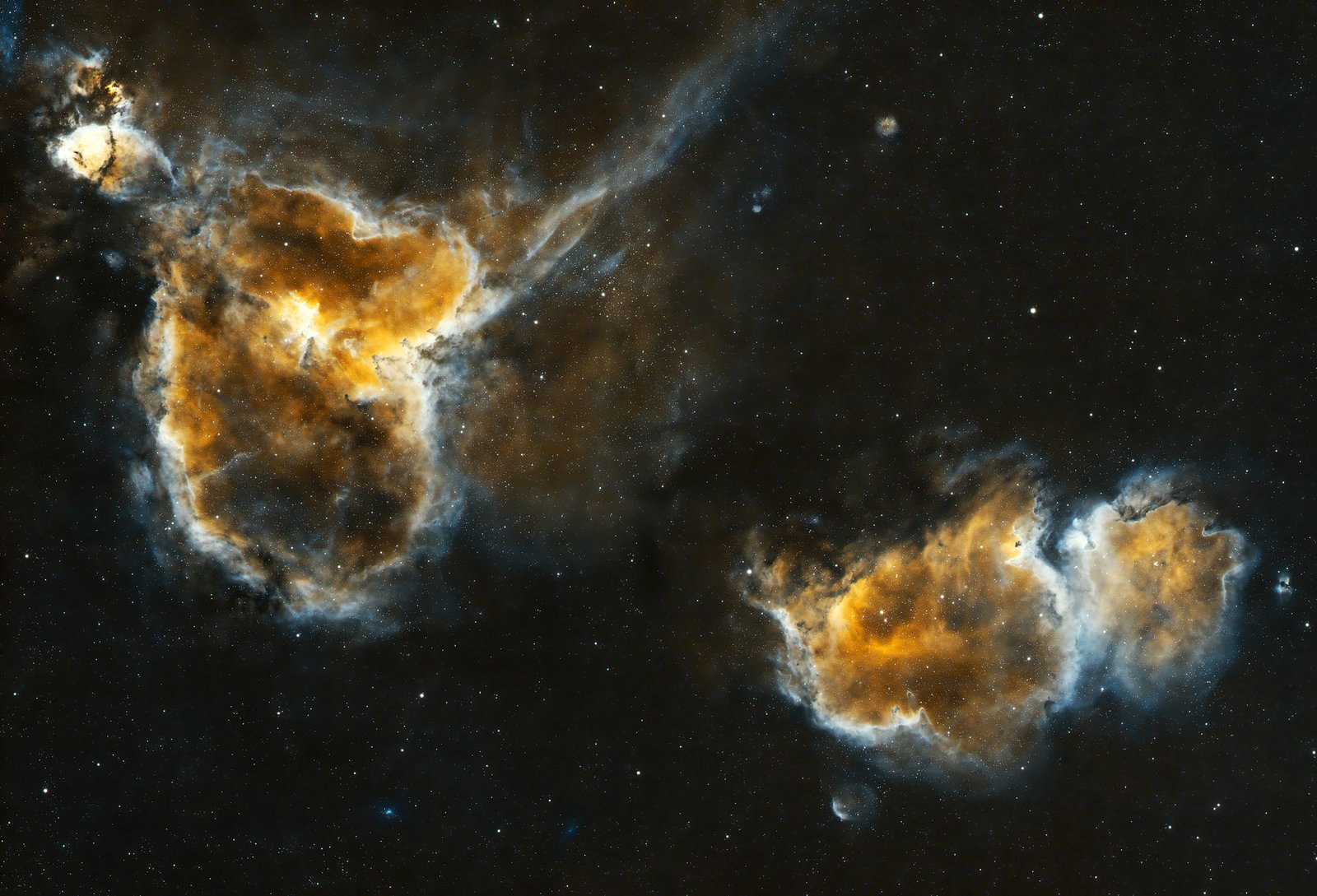 Two hearts beating in deep space. The stunning Heart & Soul Nebulae captured in full glory using the blazing-fast f/3.8 William Optics Pleiades 68 astrograph.
