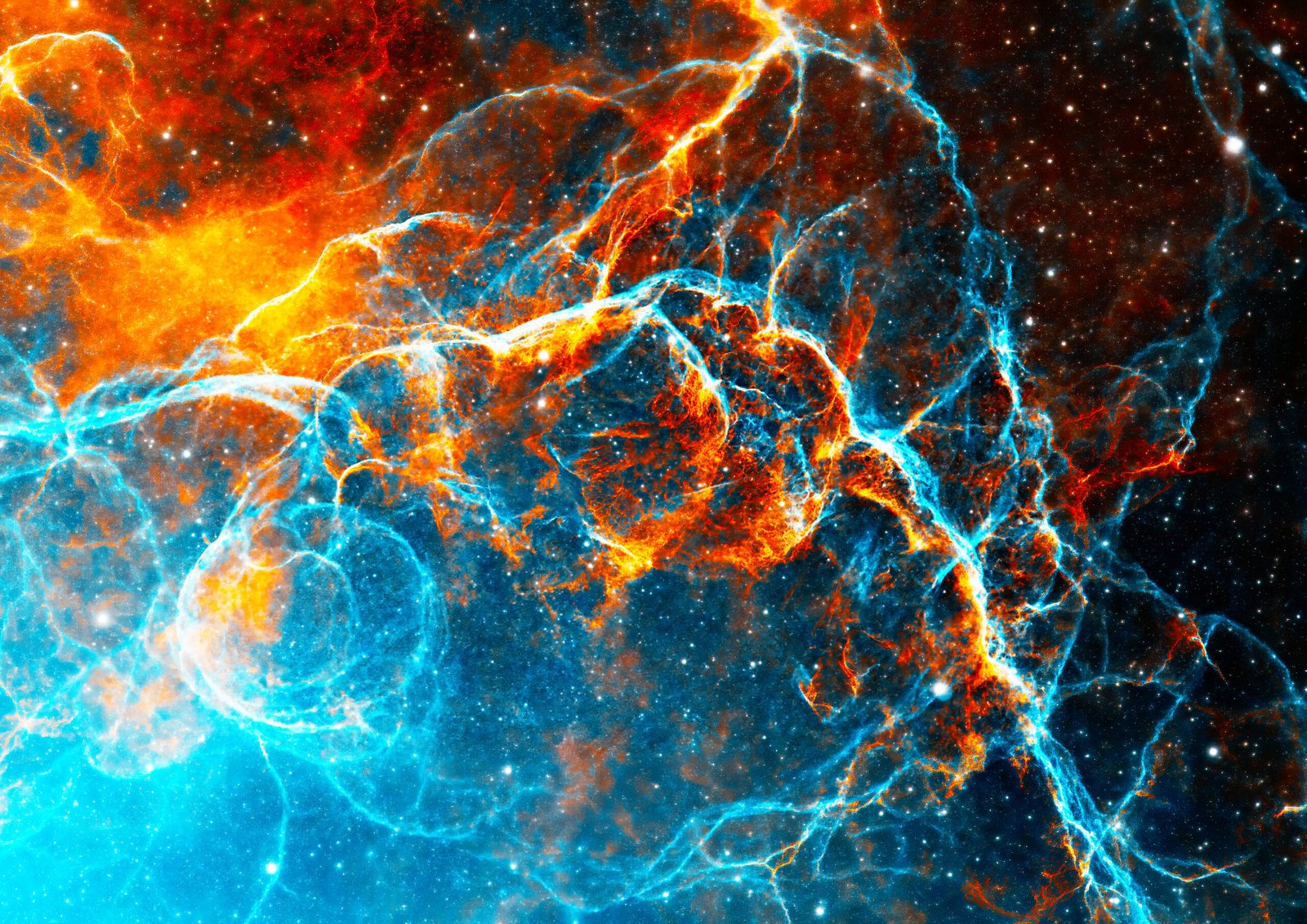 The Vela Supernova Remnant: While the initial blast wave from the core-collapse explosion roughly 11,000 years ago moved at millions of kilometres per hour (up to 10% the speed of light), it has slowed down significantly over the millennia to between 250,000 to 500,000 km/h. As the debris expands outward into interstellar space, it continuously plows into the surrounding gas and dust, creating a massive, glowing shell of shocked filaments that now spans nearly 100 light-years across.